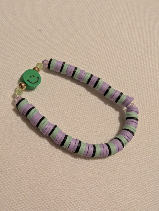 Vrolijke Armband met Groen Gezichtje β Een Kleurrijke Oppepper!