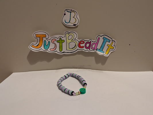 Vrolijke Armband met Groen Gezichtje – Een Kleurrijke Oppepper!